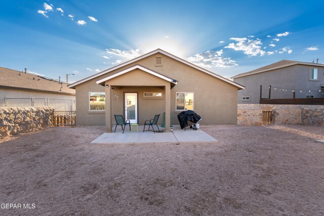11625 Flor Clavel St, El Paso, TX 79927 - rear view of property with a patio, stucco siding, and a fenced backyard