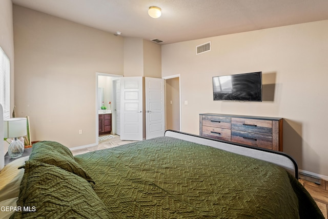 11625 Flor Clavel St, El Paso, TX 79927 - bedroom featuring vaulted ceiling and ensuite bathroom