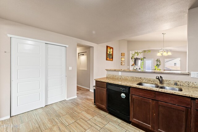 11625 Flor Clavel St, El Paso, TX 79927 - kitchen with black dishwasher, hanging light fixtures, light stone counters, a chandelier, and dark brown cabinets