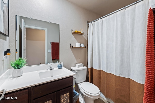 11625 Flor Clavel St, El Paso, TX 79927 - full bath featuring vanity, a textured wall, and curtained shower