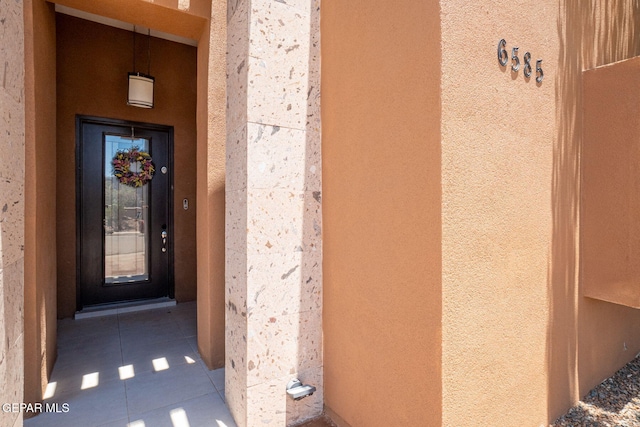 6585 Hermoso Del Sol Dr, El Paso, TX 79911 - property entrance with stucco siding
