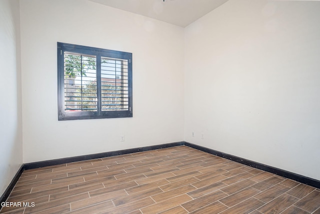 6585 Hermoso Del Sol Dr, El Paso, TX 79911 - spare room with wood tiled floors and baseboards