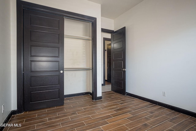 6585 Hermoso Del Sol Dr, El Paso, TX 79911 - unfurnished bedroom featuring dark wood finished floors and a closet