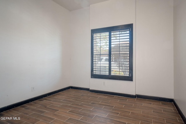 6585 Hermoso Del Sol Dr, El Paso, TX 79911 - unfurnished room featuring dark wood-type flooring and healthy amount of natural light