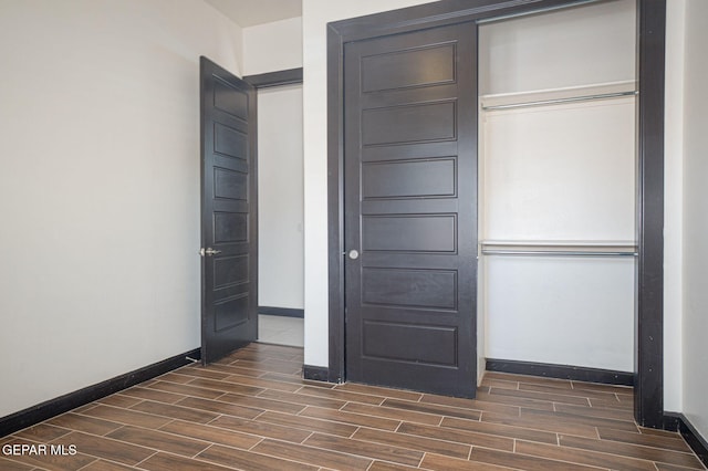 6585 Hermoso Del Sol Dr, El Paso, TX 79911 - unfurnished bedroom featuring wood finish floors and a closet
