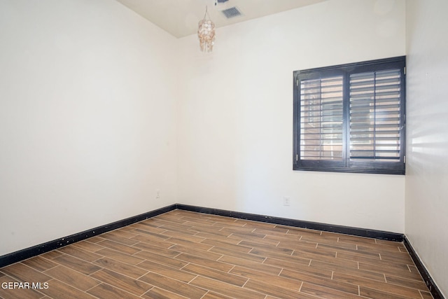 6585 Hermoso Del Sol Dr, El Paso, TX 79911 - unfurnished room with wood finished floors and baseboards