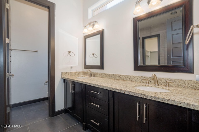 6585 Hermoso Del Sol Dr, El Paso, TX 79911 - full bath with tile patterned floors and double vanity