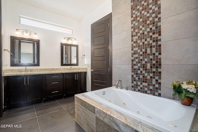 6585 Hermoso Del Sol Dr, El Paso, TX 79911 - bathroom with a whirlpool tub, double vanity, and tile patterned flooring