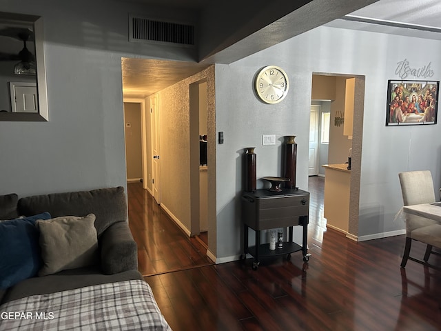 1012 Maple St, El Paso, TX 79903 - living area featuring wood finished floors and baseboards