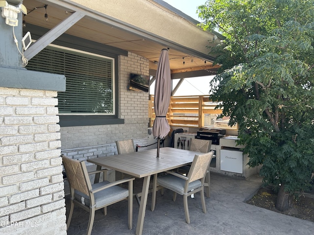 1012 Maple St, El Paso, TX 79903 - view of patio / terrace with outdoor dining area and a grill