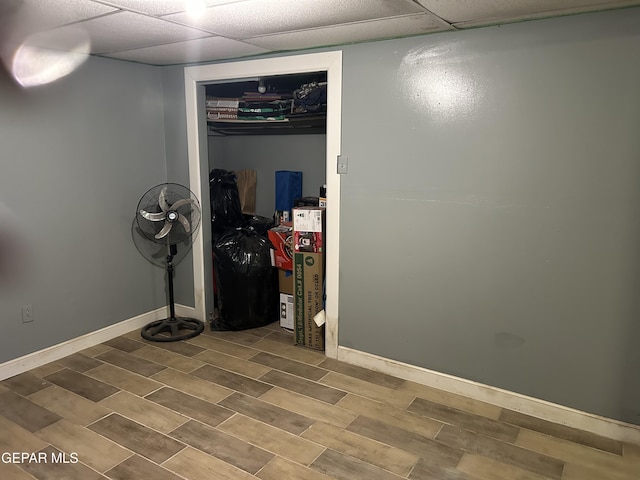 1012 Maple St, El Paso, TX 79903 - finished basement with wood tiled floors and baseboards