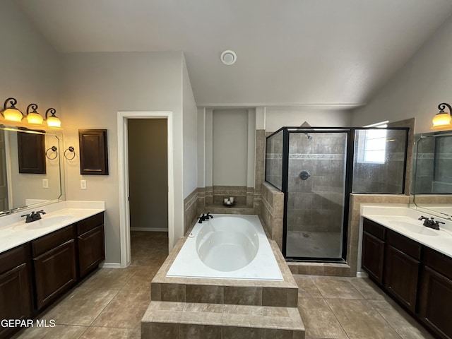 12000 Stansbury Dr, El Paso, TX 79928 - full bathroom featuring a garden tub, a stall shower, two vanities, tile patterned flooring, and lofted ceiling