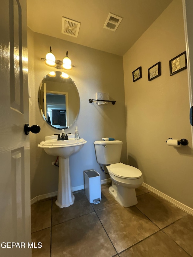 12000 Stansbury Dr, El Paso, TX 79928 - half bathroom featuring tile patterned flooring and toilet