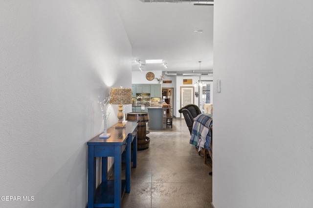 14821 Sunny Land Ave, El Paso, TX 79938 - corridor featuring concrete flooring