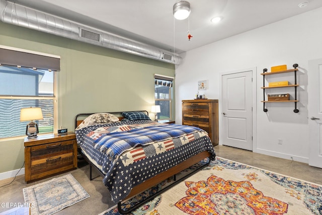 14821 Sunny Land Ave, El Paso, TX 79938 - bedroom featuring multiple windows and tile patterned flooring