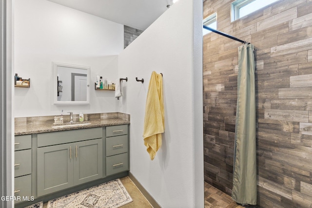 14821 Sunny Land Ave, El Paso, TX 79938 - full bathroom featuring vanity and a tile shower