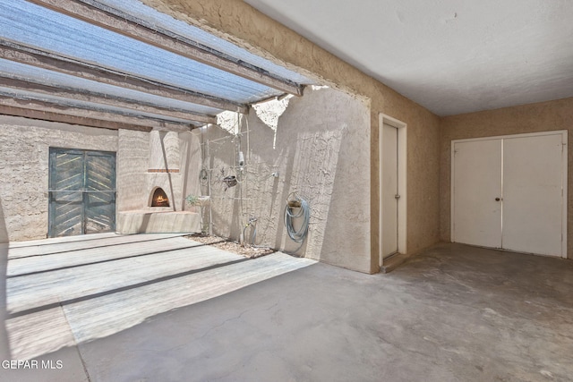 5536 Fernwood Cir, El Paso, TX 79932 - unfurnished living room featuring concrete floors