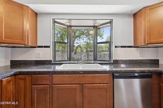 5536 Fernwood Cir, El Paso, TX 79932 - kitchen featuring dishwasher, brown cabinetry, decorative backsplash, and dark stone countertops