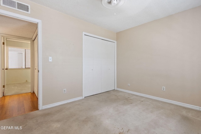 5536 Fernwood Cir, El Paso, TX 79932 - unfurnished bedroom featuring carpet flooring and a closet
