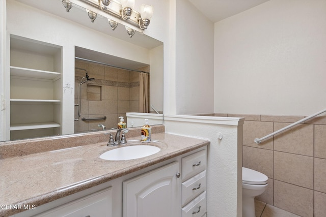 5536 Fernwood Cir, El Paso, TX 79932 - full bathroom with vanity, curtained shower, and tile walls