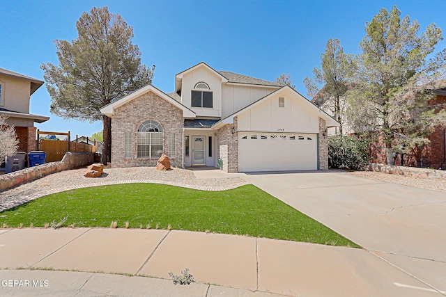 11948 Crown Oaks Ct, El Paso, TX 79936 - traditional home featuring brick siding, an attached garage, concrete driveway, and board and batten siding