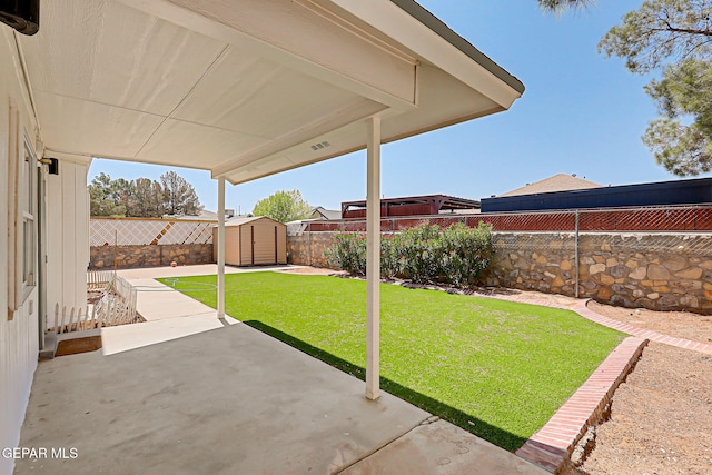 11948 Crown Oaks Ct, El Paso, TX 79936 - fenced backyard featuring a storage unit and a patio