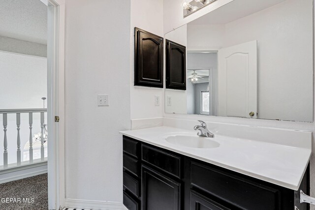 11948 Crown Oaks Ct, El Paso, TX 79936 - bathroom with vanity, ceiling fan, and healthy amount of natural light