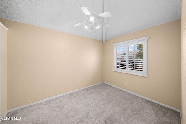 11984 Manuel Acosta Dr, El Paso, TX 79936 - spare room featuring carpet flooring, lofted ceiling, and ceiling fan