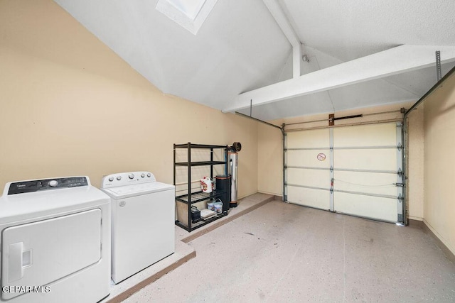 11984 Manuel Acosta Dr, El Paso, TX 79936 - garage with washer and dryer and water heater
