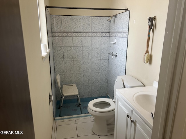 327 Jesuit Dr, El Paso, TX 79907 - bathroom featuring tile patterned floors, a tile shower, and vanity