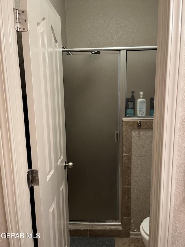 14428 Johnny Mata Dr, El Paso, TX 79938 - bathroom with a shower stall and tile patterned flooring