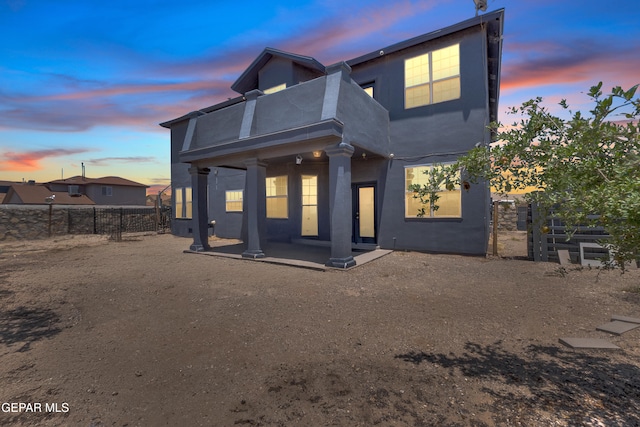 3165 Destiny Point Dr, El Paso, TX 79938 - rear view of house with a fenced backyard, a patio, stucco siding, and a balcony