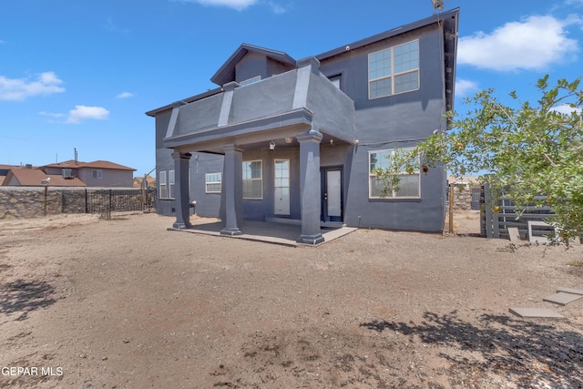 3165 Destiny Point Dr, El Paso, TX 79938 - back of property featuring a fenced backyard, a patio area, and stucco siding