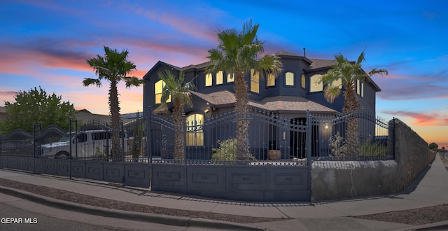 3165 Destiny Point Dr, El Paso, TX 79938 - mediterranean / spanish-style home featuring a fenced front yard, a gate, and stucco siding