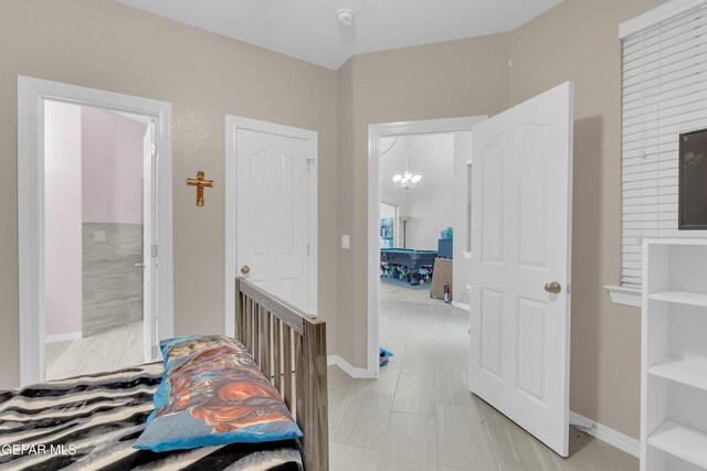 3165 Destiny Point Dr, El Paso, TX 79938 - bedroom featuring a chandelier and baseboards