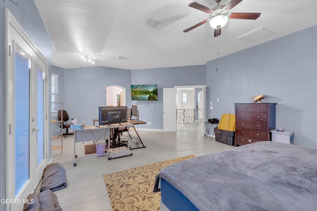 3165 Destiny Point Dr, El Paso, TX 79938 - bedroom with an office area and arched walkways