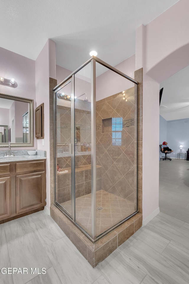 3165 Destiny Point Dr, El Paso, TX 79938 - bathroom with vanity and a stall shower