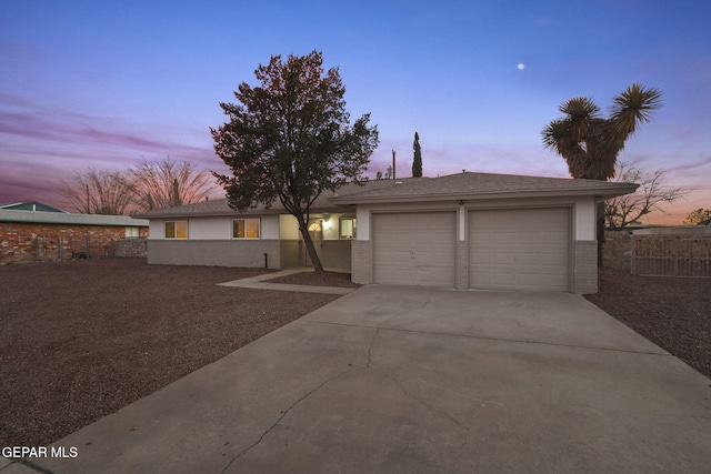 15081 Darrington Rd, Horizon City, TX 79928 - ranch-style home featuring driveway, a garage, and brick siding