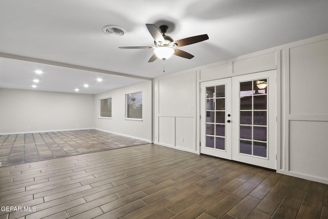 15081 Darrington Rd, Horizon City, TX 79928 - unfurnished living room with a ceiling fan, french doors, recessed lighting, and dark wood-style flooring