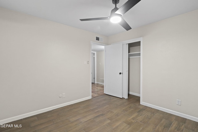 15081 Darrington Rd, Horizon City, TX 79928 - unfurnished bedroom featuring wood finished floors, a closet, and ceiling fan
