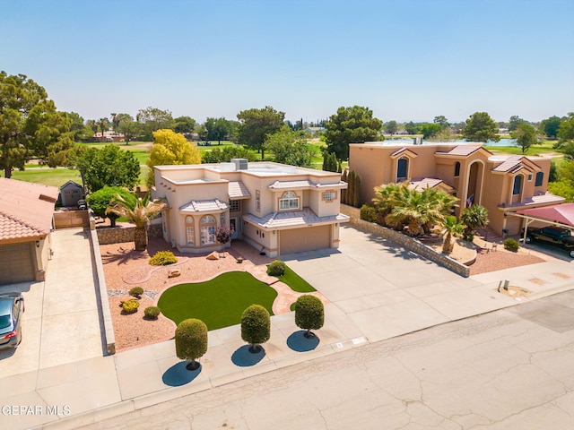 18986 Armington Dr, Horizon City, TX 79928 - view of front facade featuring an attached garage, concrete driveway, and stucco siding