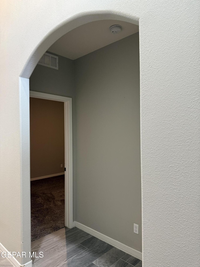 229 Epsom Dr, El Paso, TX 79928 - unfurnished room featuring arched walkways and a smoke detector