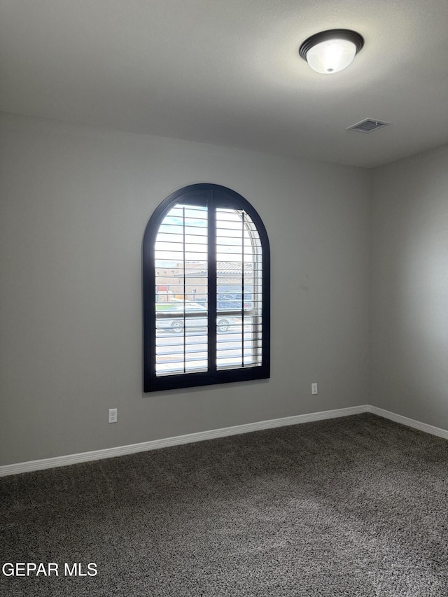 229 Epsom Dr, El Paso, TX 79928 - empty room featuring dark carpet and baseboards