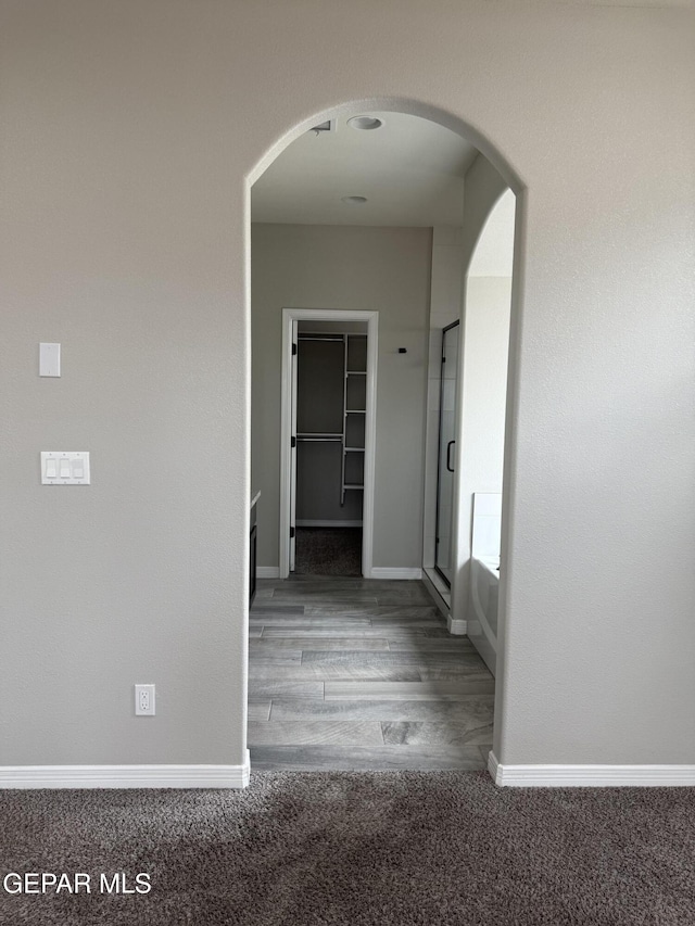 229 Epsom Dr, El Paso, TX 79928 - corridor featuring arched walkways and carpet floors