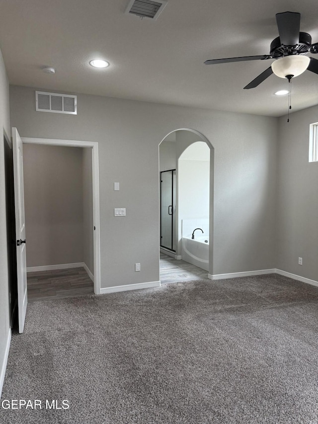 229 Epsom Dr, El Paso, TX 79928 - empty room with carpet flooring, a ceiling fan, arched walkways, and recessed lighting