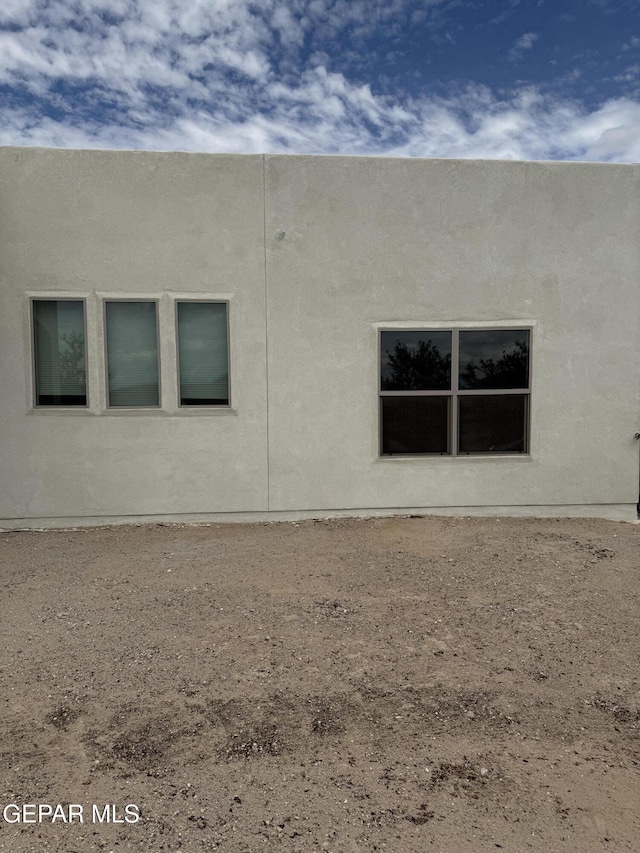 229 Epsom Dr, El Paso, TX 79928 - view of side of property featuring stucco siding
