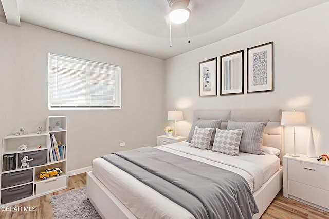 125 N Nevarez Rd, Socorro, TX 79927 - bedroom featuring light wood-style flooring and ceiling fan