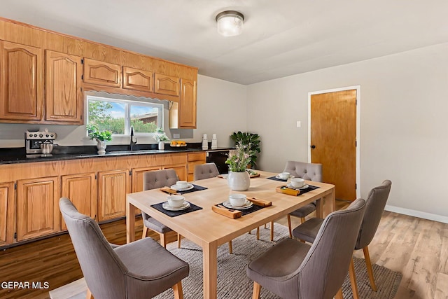 125 N Nevarez Rd, Socorro, TX 79927 - dining space featuring light wood-type flooring and baseboards