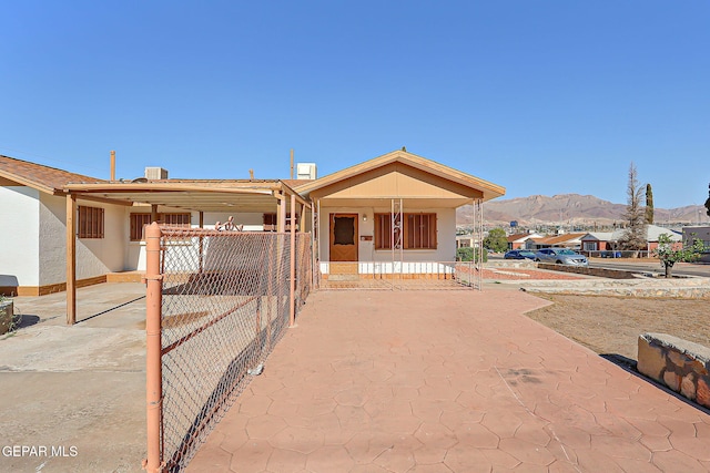 4330 Frankfort Ave, El Paso, TX 79903 - manufactured / mobile home featuring a mountain view, a porch, and stucco siding