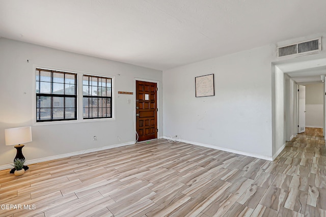 4330 Frankfort Ave, El Paso, TX 79903 - foyer entrance with light wood finished floors and baseboards